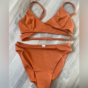 Brand new- Parade crisscross swim top and high waisted bottoms